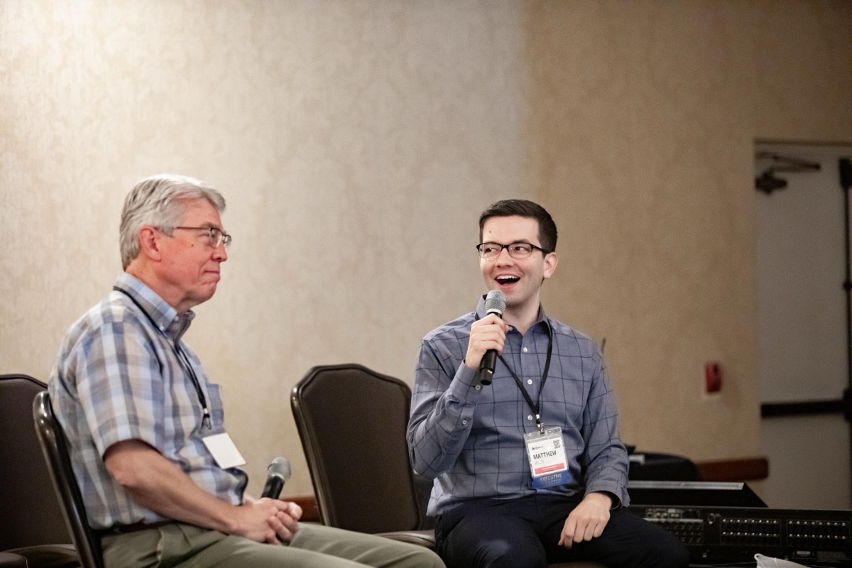 Matthew Vines and his father, Monte, in conversation on stage